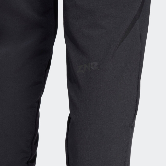 ADIDAS WOMEN'S Z.N.E. WOVEN PANTS | Püksid | Sportland