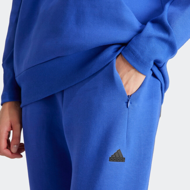 ADIDAS WOMEN'S Z.N.E. PANTS | Püksid | Sportland